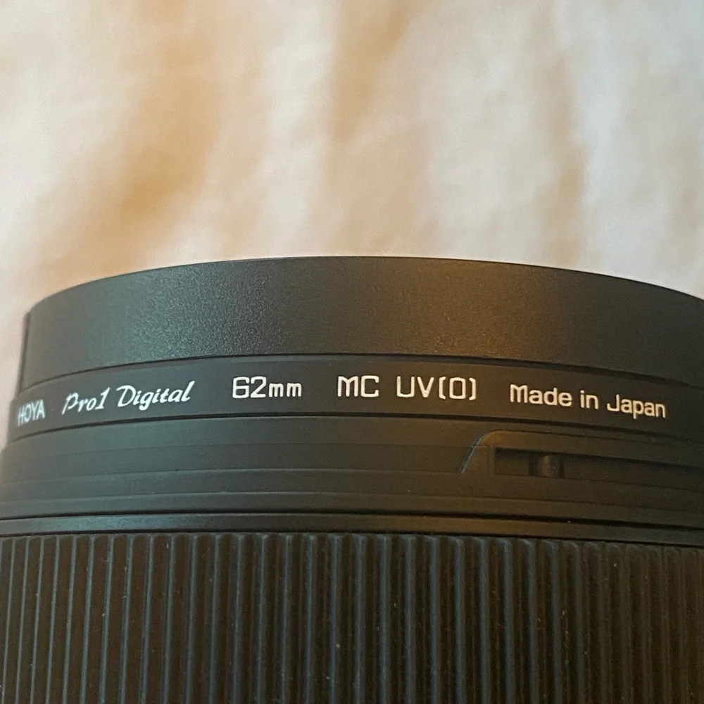 Sigma 30 mm 1.4 DC camera lens for Canon